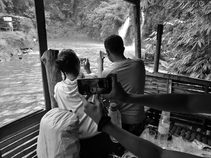 People photographing scenics waterfall