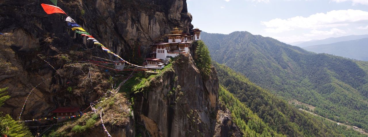 Paro taktsang on mountain against sky