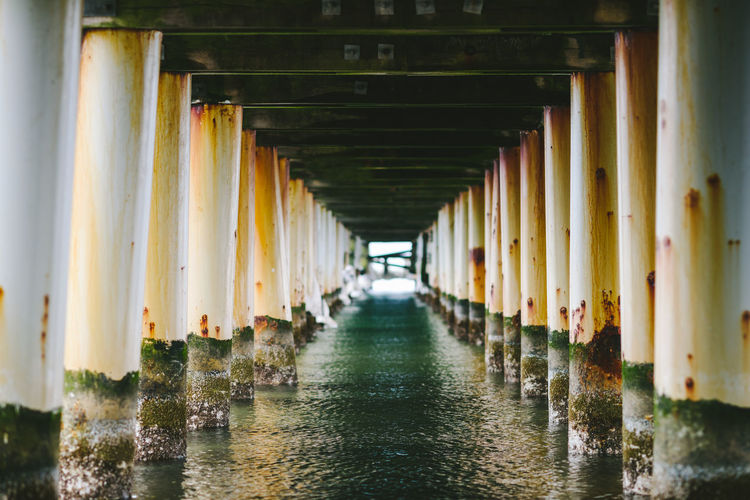Corridor of water under pier