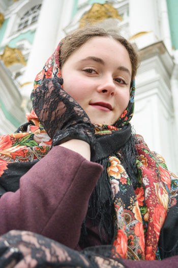 Portrait of young woman looking away