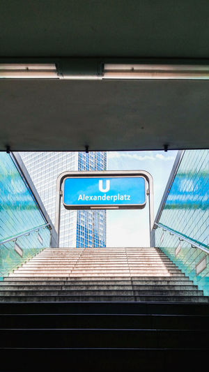Low angle view of information sign at subway station