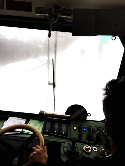 Cropped image of woman driving car