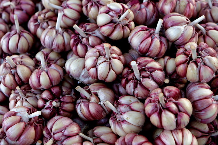 Full frame shot of garlic for sale at market stall