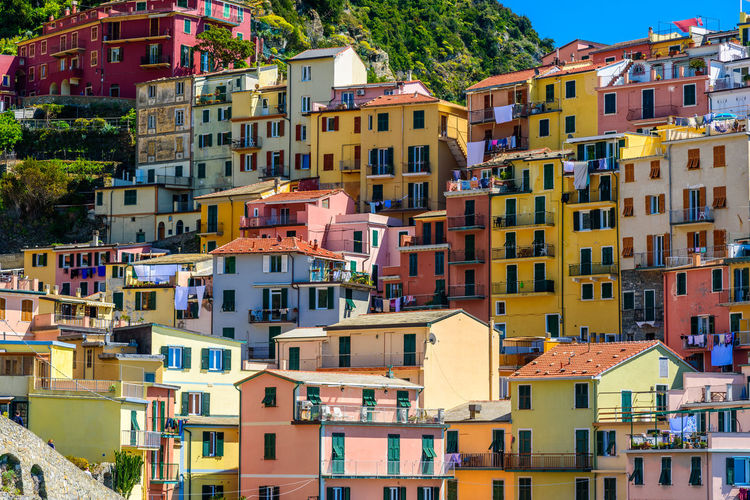 Exterior of buildings at manarola on sunny day