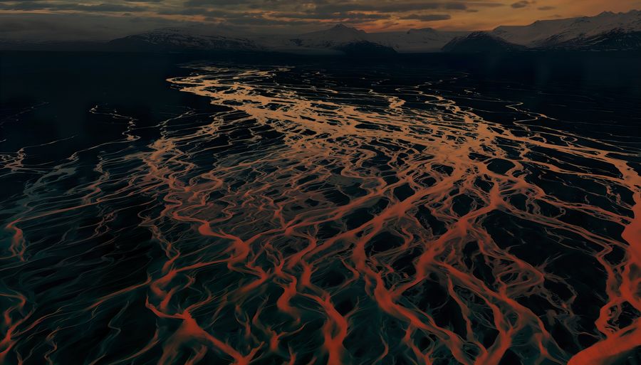 Aerial view of sea against sky during sunset
