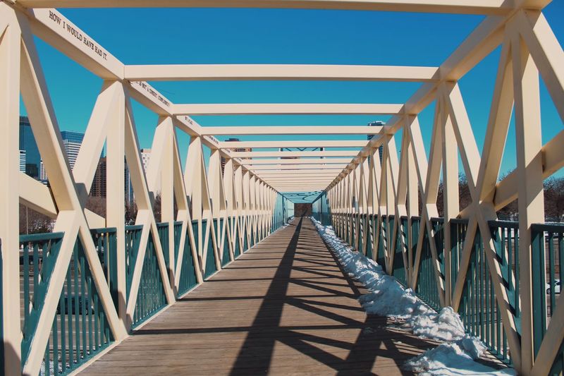 Empty footbridge in city