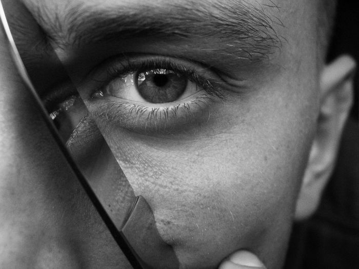 Close-up portrait of man with knife