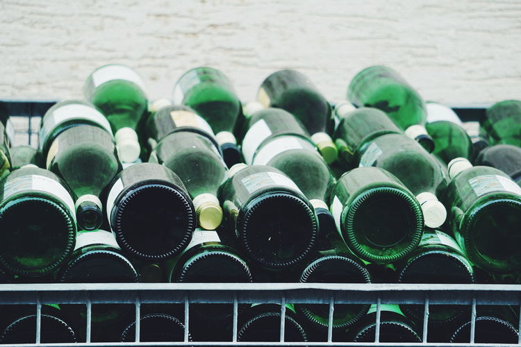 Full frame shot of wine bottles for sale in store