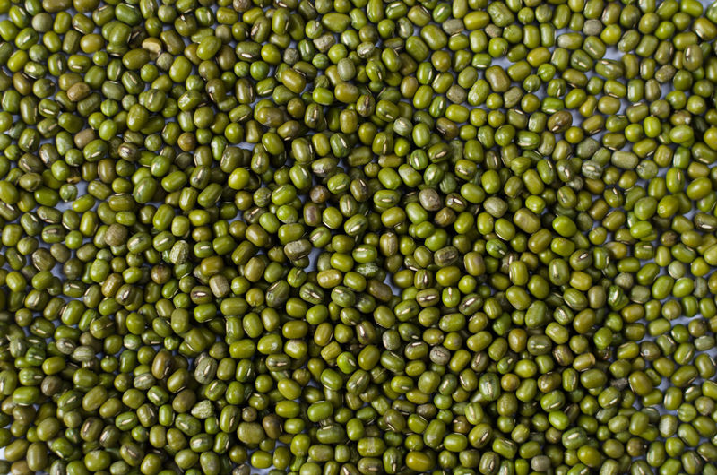 Full frame shot of green lentils on table