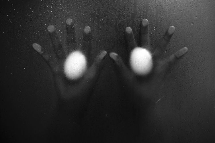 Full frame shot of wet glass window