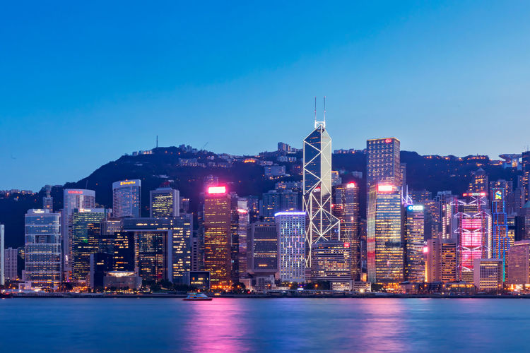 Illuminated buildings at waterfront