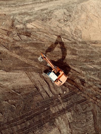 Aerial view of bulldozer on land