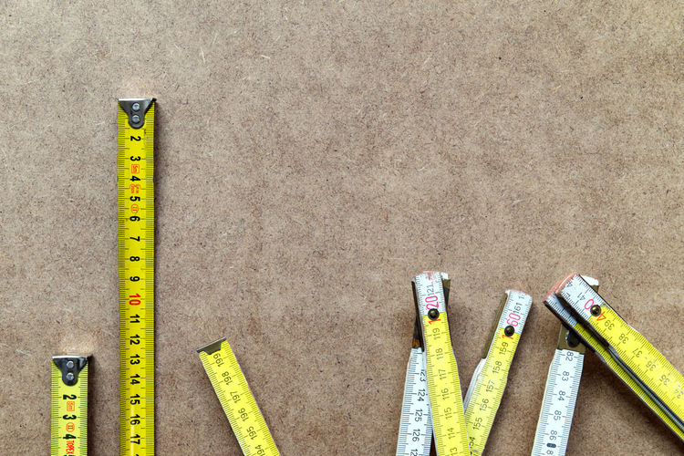 High angle view of tape measure on table
