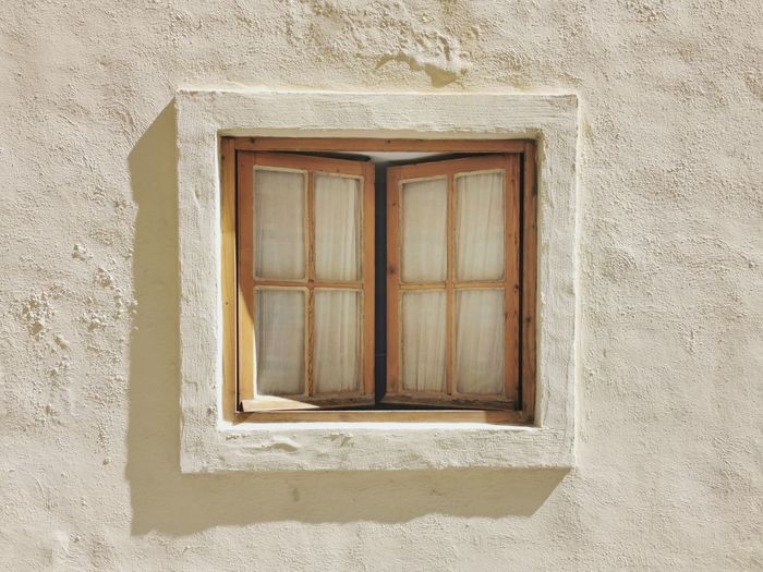 Closed window of old building