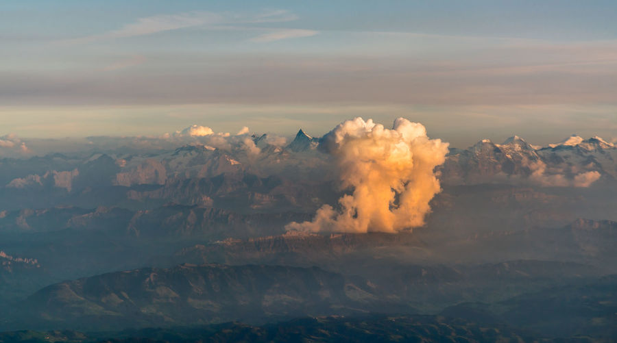 Scenic view of mountains against sky during sunset
