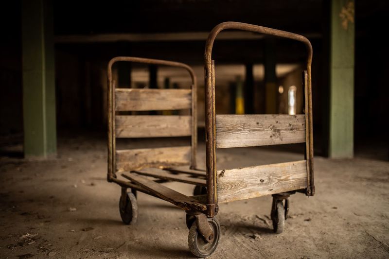 Old rusty cart in abandoned building