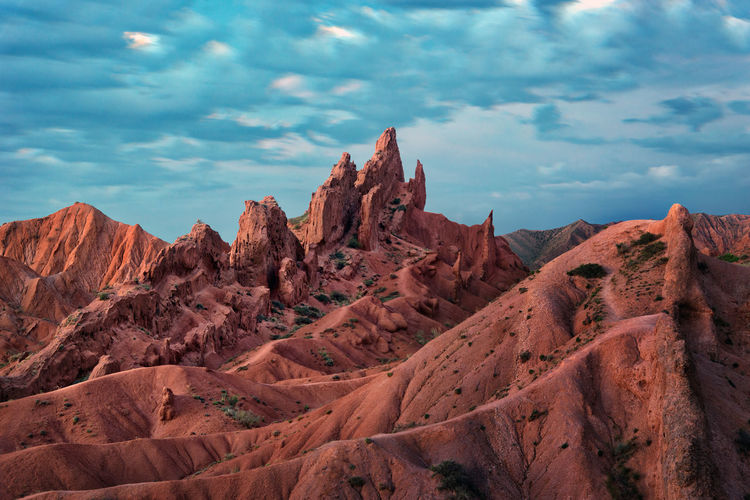 Panoramic view of rock formations against sky