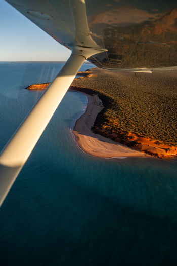 Sunset flight over shark bay, western australia.