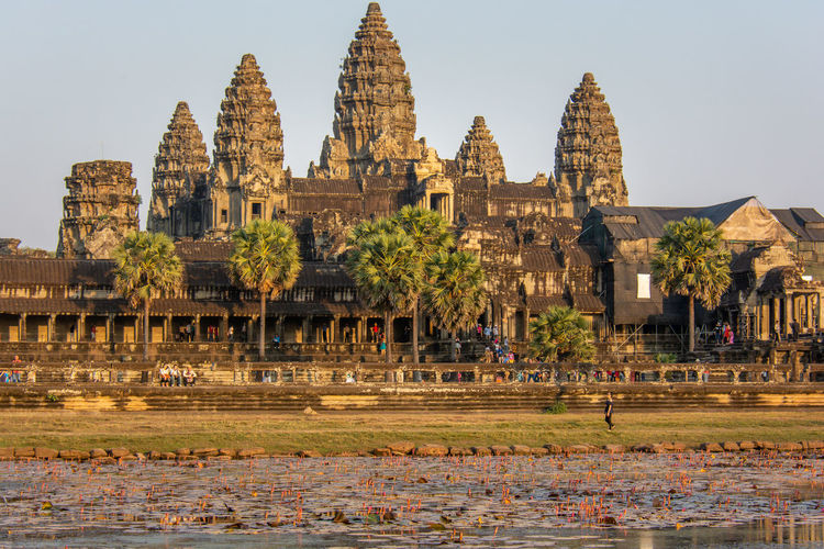 View of temple against buildings