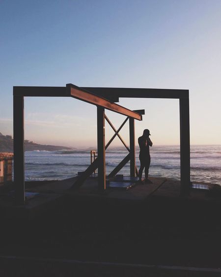 Scenic view of sea at sunset