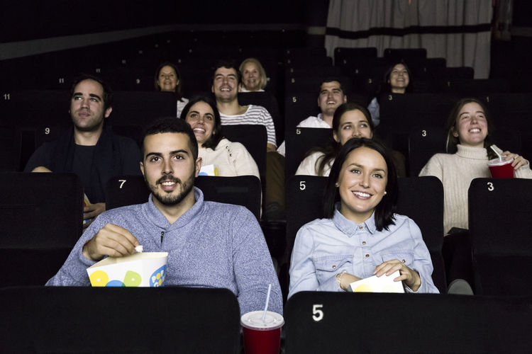People watching a movie in a cinema