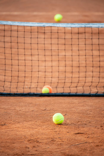 Close-up of tennis balls on court