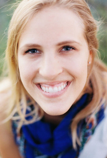 Close-up portrait of a smiling young woman
