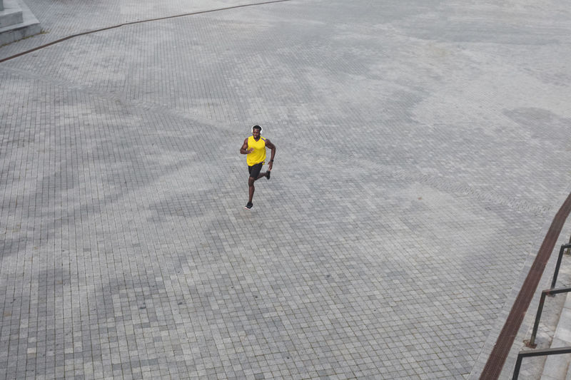 Rear view of man walking in city
