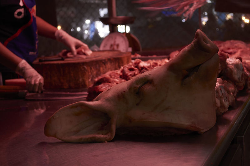 Close-up of butcher working