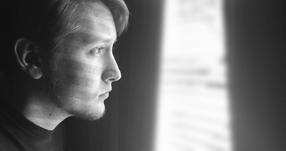 Close-up of man looking away