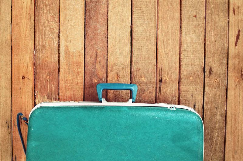 Close-up of blue suitcase