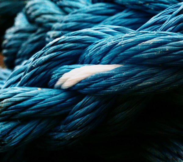 Full frame shot of blue ropes at harbor