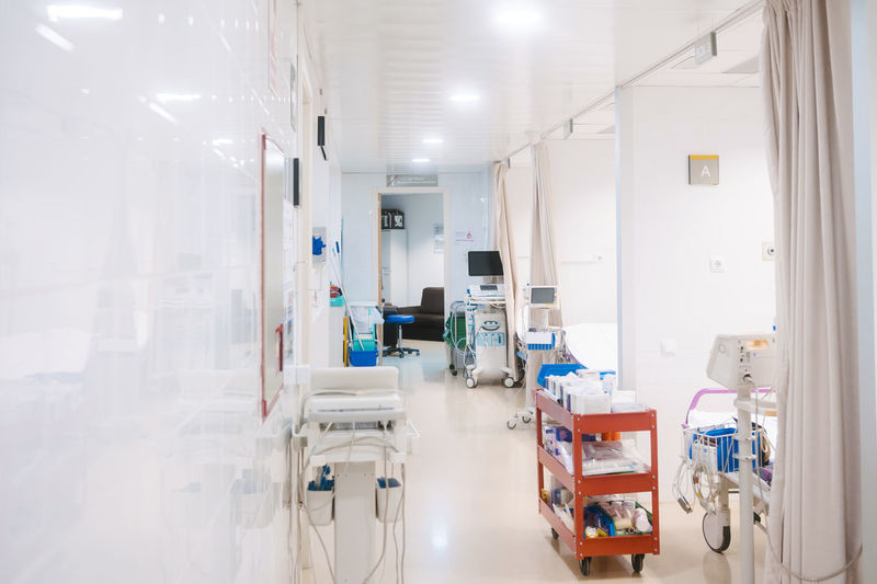 Cart with supplies and medical equipment in hospital alley