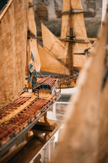 Close-up of wooden war ship model against blurred background