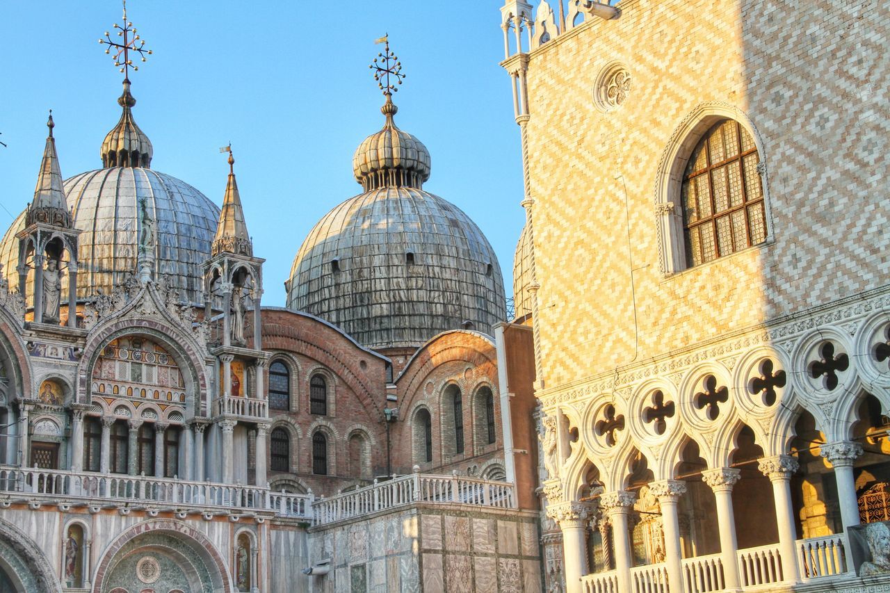 St marks cathedral and doges palace against clear blue sky