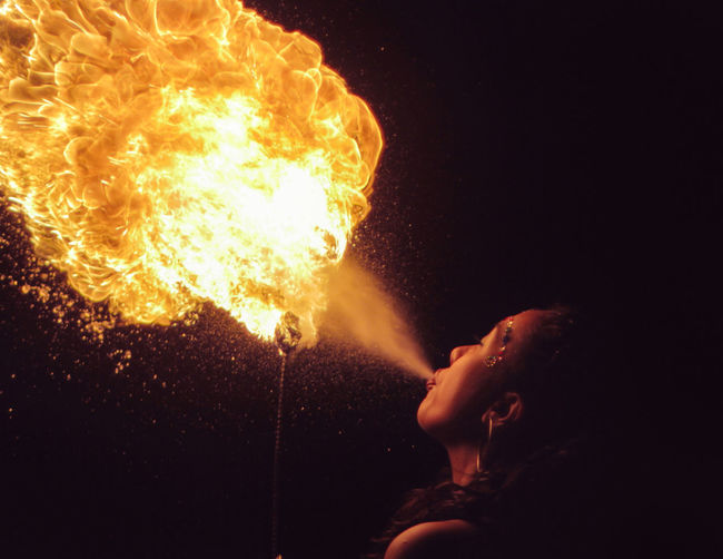 Woman playing with fire