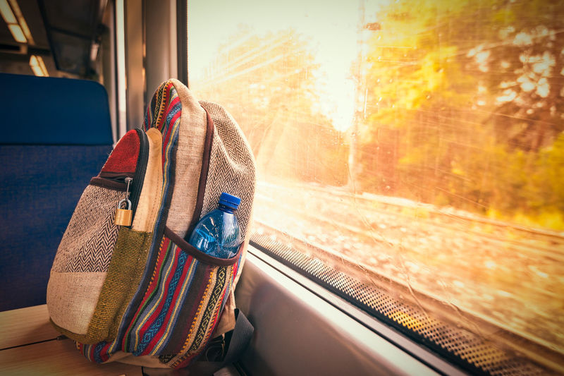 Bag on table by window in train