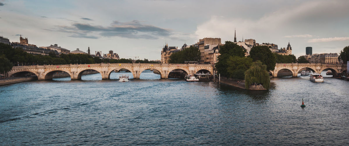 Panorama of the famous pont neuf on a summer sky in paris france