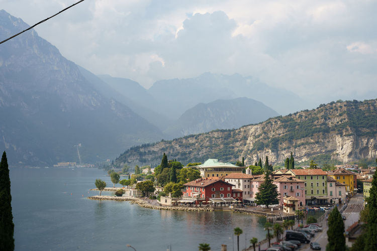 Panoramic view of buildings and mountains against sky