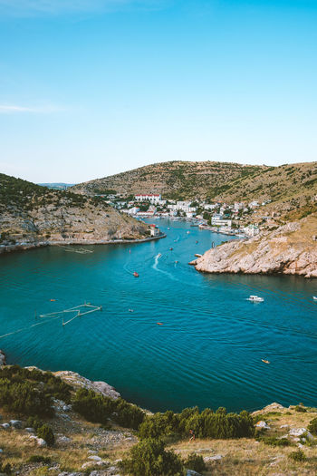 High angle view of sea against blue sky