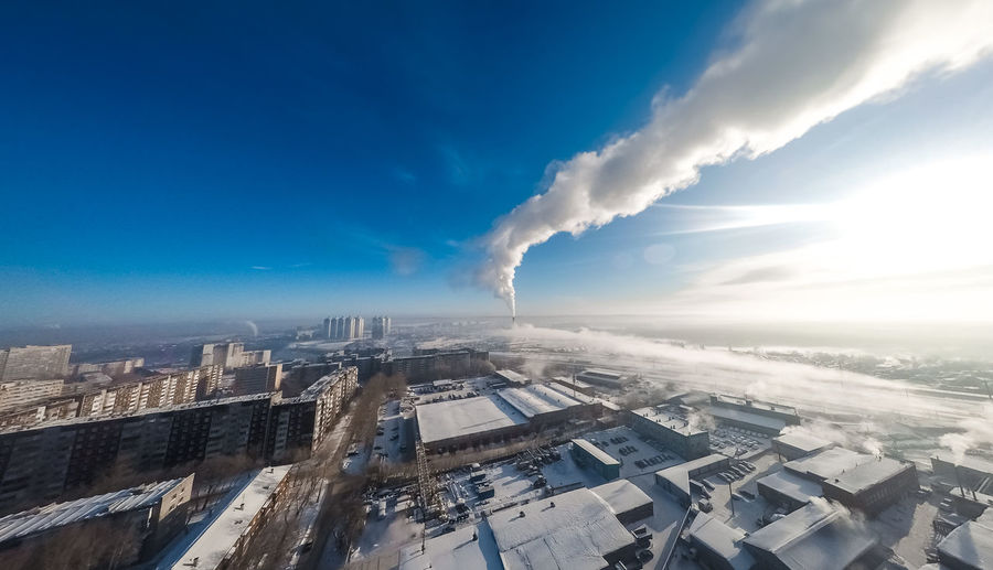 Perm panorama in cold winter with smoking boiler room 