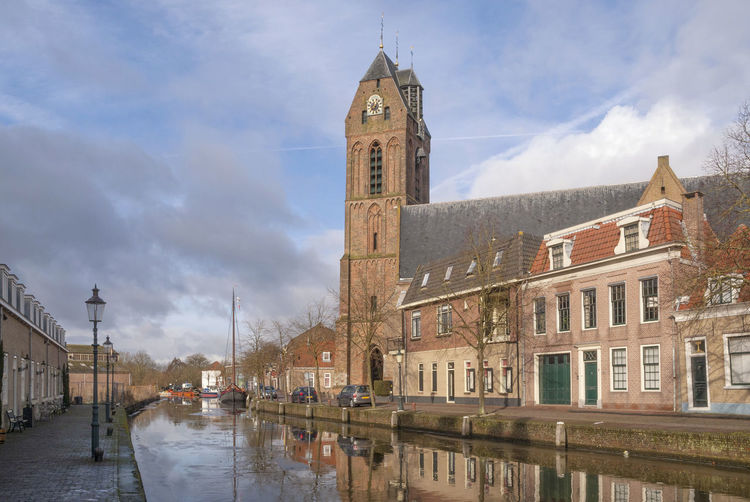 The st. michael church in the dutch historical town oudewater along the river hollandsche ijssel