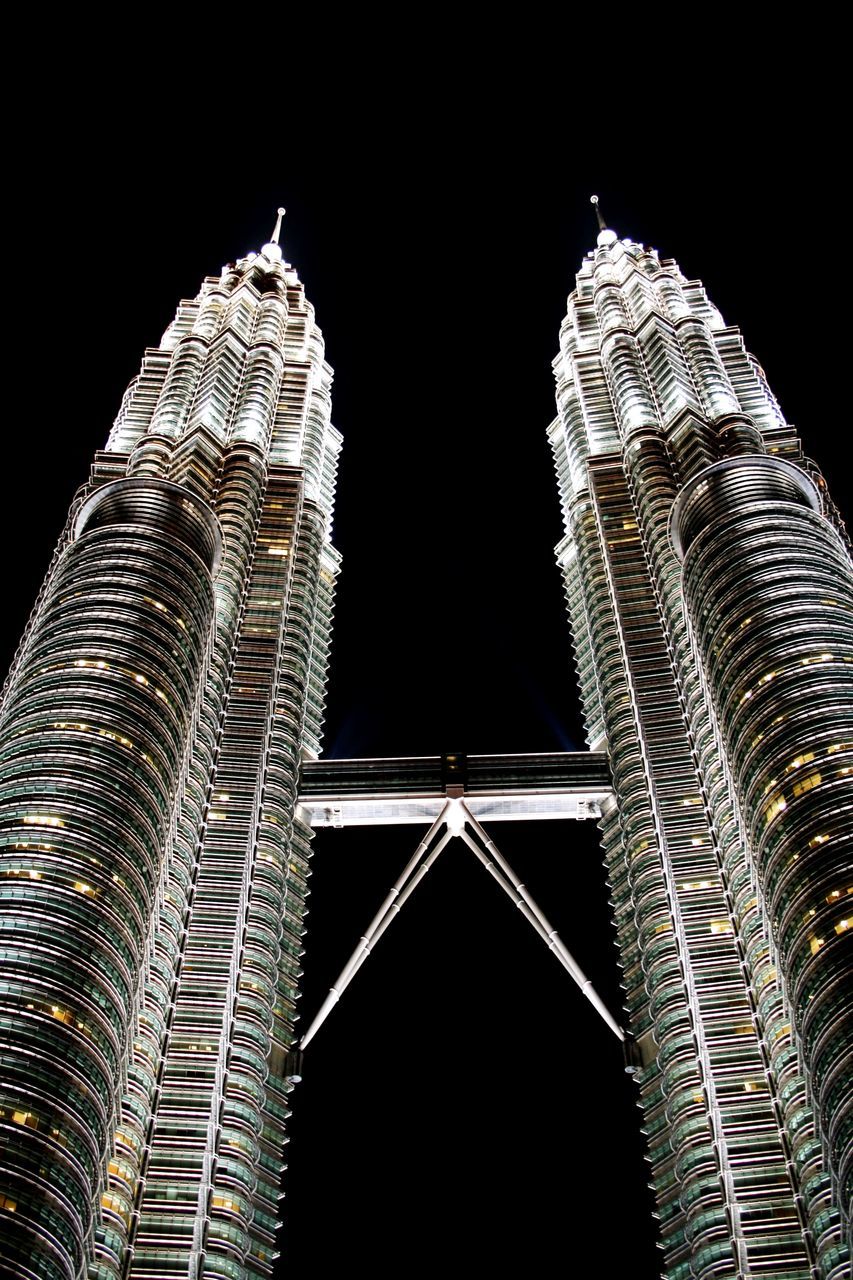LOW ANGLE VIEW OF ILLUMINATED BUILDINGS AGAINST SKY