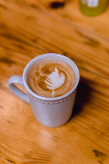 High angle view of cappuccino on table