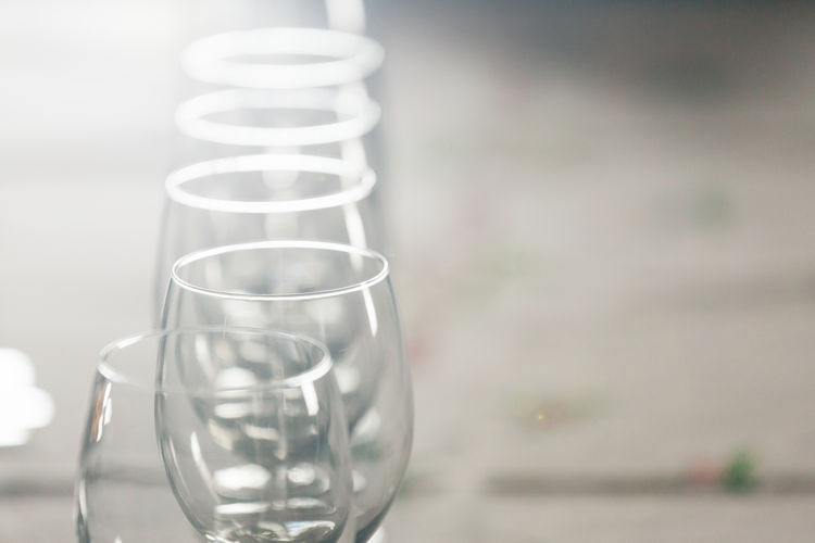 Close-up of empty wineglasses in table