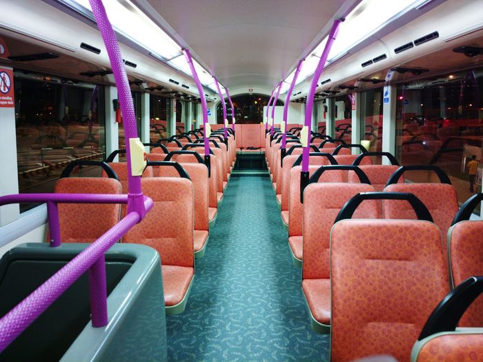 ROW OF TRAIN IN EMPTY SEATS