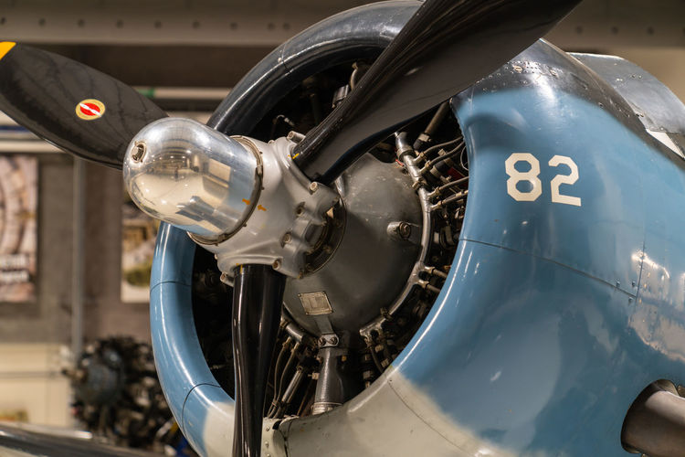Close-up of jet engine at airplane hangar