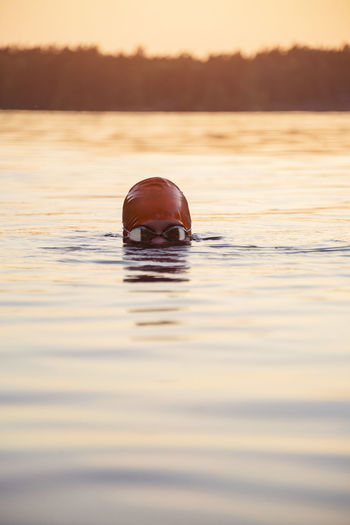 Portrait of man swimming in sea
