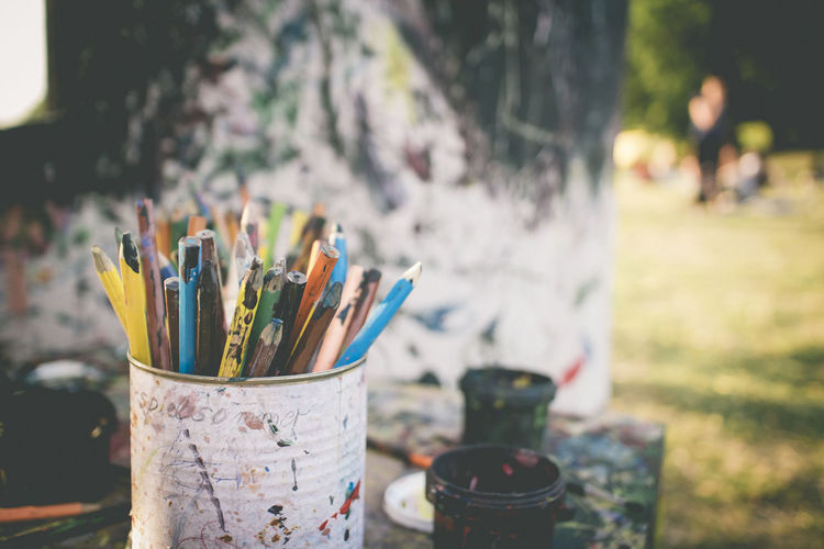 High angle view of art and craft equipment on table