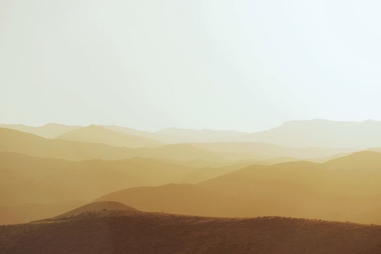 Scenic view of mountains against clear sky